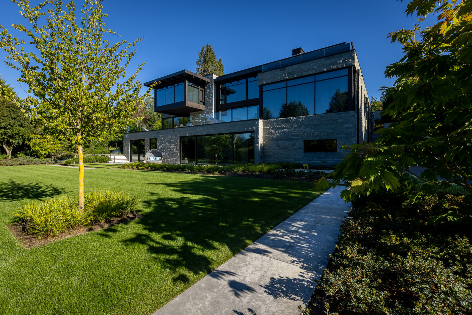 High end landscape construction by Fossil Landscape Construction in Vancouver BC featuring refined outdoor spaces, detailed craftsmanship and timeless design.